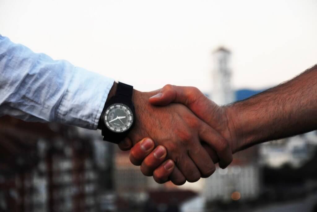 handshake to close business deal